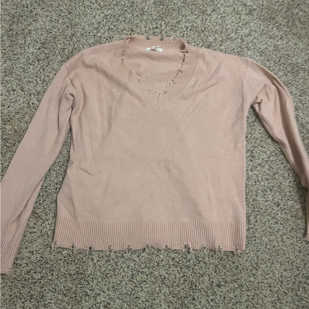 Maurice’s pink sweater